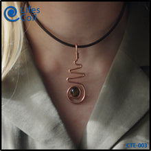 Load image into Gallery viewer, Copper Coil Pendant Representing Female with Tiger Eye Stone